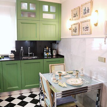 Cocina con muebles verdes