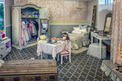 Inspiration for a traditional kids' bedroom for girls in Orange County with grey walls.