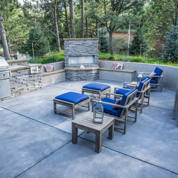 Hillside Outdoor Living With a Natural Water Feature