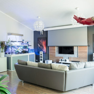 Home theater - contemporary home theater idea in Stuttgart