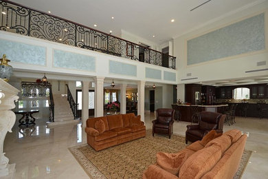 Island style living room photo in Miami