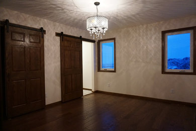 Example of a mid-sized transitional bedroom design in Other
