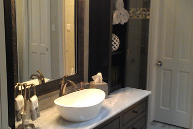 Bathroom - traditional white tile bathroom idea in Dallas with marble countertops and beige walls