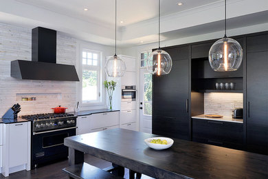 Inspiration for a mid-sized contemporary l-shaped eat-in kitchen in Ottawa with flat-panel cabinets, white cabinets, white splashback, black appliances, an undermount sink, solid surface benchtops, marble splashback, dark hardwood floors and with island.