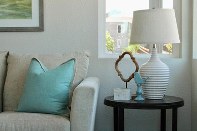 Example of a cottage living room design in Denver