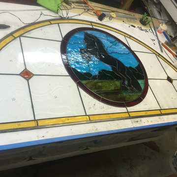 Half-moon colored glass windows