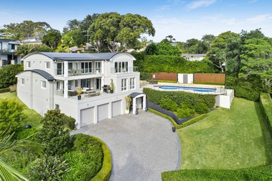 Photo of a large beach style home design in Sydney.