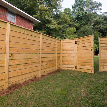 Horizontal privacy fence and 4 rail fence