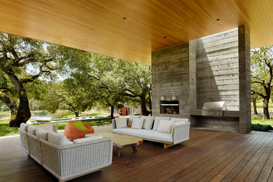 Inspiration for a contemporary deck in San Francisco with a roof extension.