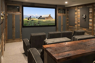 Mid-sized transitional enclosed carpeted and beige floor home theater photo in Philadelphia with a projector screen and brown walls