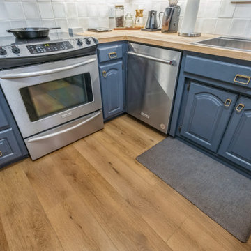 Kingswood Signature| Modin Rigid LVP Collection Transitional Customer Space | TX