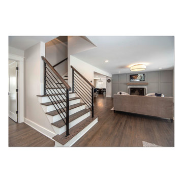 Whole Home Reno with addition at Master Bedroom. Relocated basement stairs.