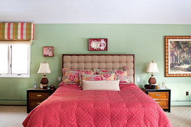 Elegant bedroom photo in New York with green walls