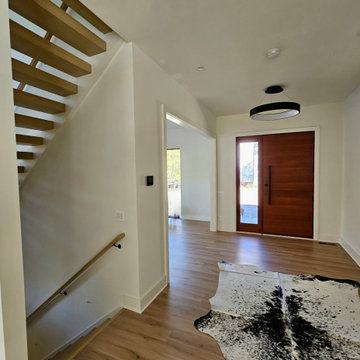 Project #111 | Open-Riser Staircase with Glass Panel Detail
