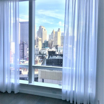 111 Murray St- Battery Operated Shades and Curved Drapery