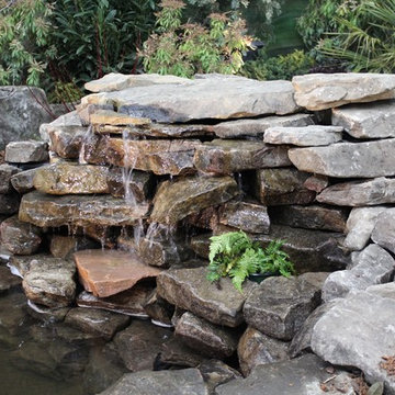 Natural Stone Waterfall Installation in Brentwood Tennessee