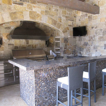 Mediterranean Patio with Outdoor TVs