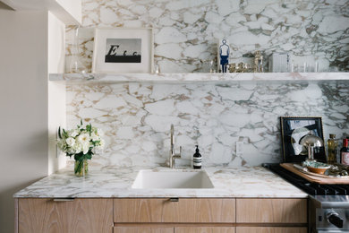 Example of a small trendy galley light wood floor eat-in kitchen design in New York with an undermount sink, flat-panel cabinets, medium tone wood cabinets, marble countertops, multicolored backsplash, marble backsplash, stainless steel appliances, no island and multicolored countertops