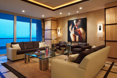 Example of a large trendy formal and enclosed light wood floor living room design in Miami with beige walls, no fireplace and no tv