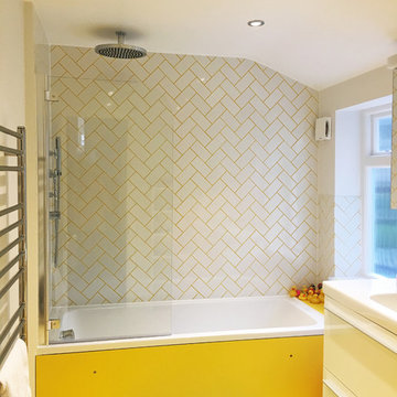 Yellow bathroom in North London renovation