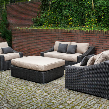 Toja Patio Furniture - Tuscan Love Seat Set - Red Brick Wall