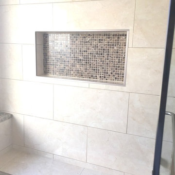 Large traditional walk in shower with bench