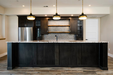 Example of a transitional kitchen design in Denver