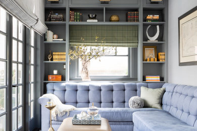 Example of a classic wallpaper family room design in San Francisco with blue walls and a wall-mounted tv