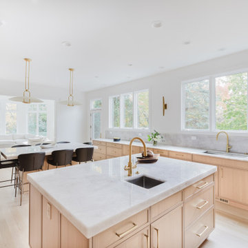 Modern Natural Kitchen in Glencoe With Marble Island and Expansive Windows