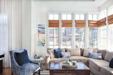 Living room - mid-sized contemporary formal and open concept medium tone wood floor and brown floor living room idea in Orange County with white walls, no fireplace and no tv