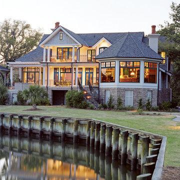 New Home Exterior With Essence Wood Windows by Milgard