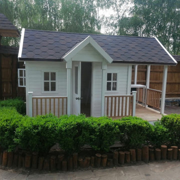 Custom Playhouse with Covered Game Terrace – Crane-Delivered