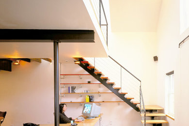Example of a trendy home office design in New York