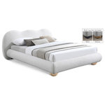 Meridian Furniture - Hyde Boucle Fabric Upholstered Bed, Cream, King - Escape to a haven of restful nights and luxurious mornings with the Hyde Boucle Fabric Bed, a versatile centerpiece that caters to your unique style and comfort preferences. The bed is enveloped in rich cream boucle fabric, its sumptuous texture adding depth and dimension to your bedroom. This captivating material creates a striking contrast against lighter bedding and decor, ensuring your bed remains a stylish focal point regardless of your chosen aesthetic. The appeal doesn't stop at beauty. It offers the unique option of both natural finish and black finish solid wood legs, included with each bed. This allows you to effortlessly adapt the bed to your existing decor or even transform its entire look with a simple switch. Unwind, relax, and experience the true meaning of blissful sleep with the Hyde Boucle King-sized Fabric Bed.