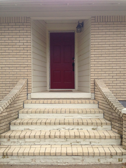 Pale yellow brick house