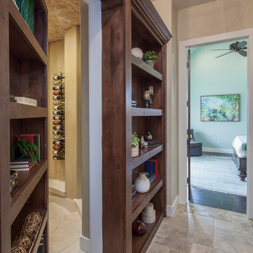 Library wall- opens to hidden wine cellar- 2014 Parade Home in Willie Nelson's T
