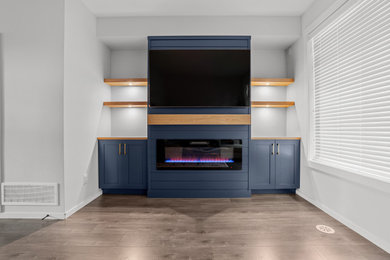 Minimalist family room photo in Vancouver