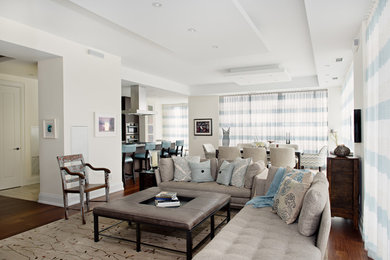 Large trendy open concept dark wood floor living room photo in Toronto with beige walls