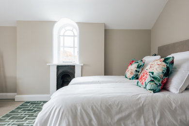 Classic guest and grey and white bedroom in Hampshire with a chimney breast.