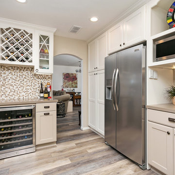 A wine enthusiasts kitchen with a french cafe feel