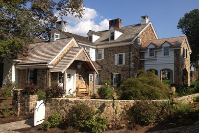 Example of a country exterior home design in Philadelphia