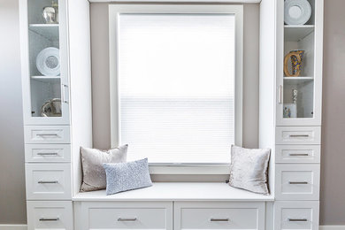 Trendy master carpeted and gray floor bedroom photo in Other with gray walls and no fireplace