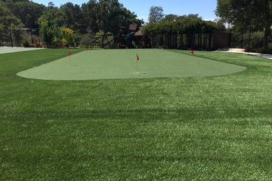 Large artificial grass installation with a putting green.