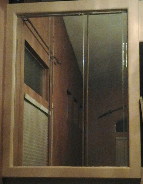 Help 2 outdated mirrors on my living room walls.