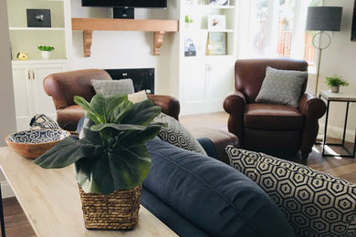 Transitional family room photo in Other