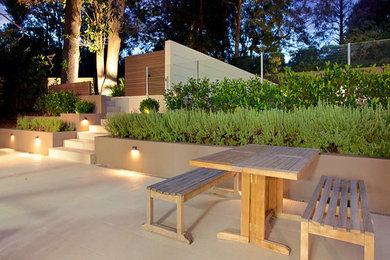 This is an example of a contemporary patio in Gold Coast - Tweed.