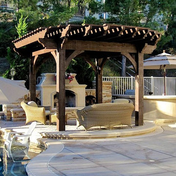 Poolside Timber Frame Pergola with Outdoor Fireplace