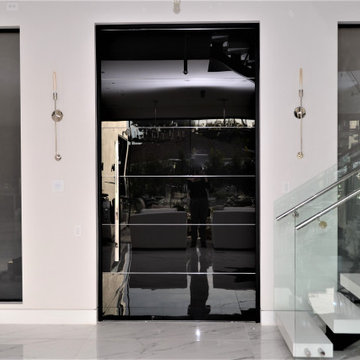 Custom Frameless Black Laminated Glass Oversized Pivot Door