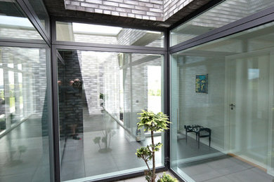 Trendy home design photo in Esbjerg