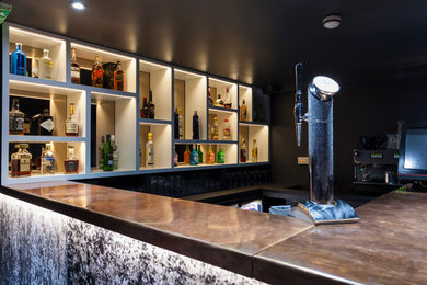 Design ideas for a contemporary home bar in London.